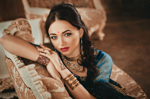 Wedding_bride_henna_portrait of a beautiful Indian woman in traditional dress _ home services _ House Service App